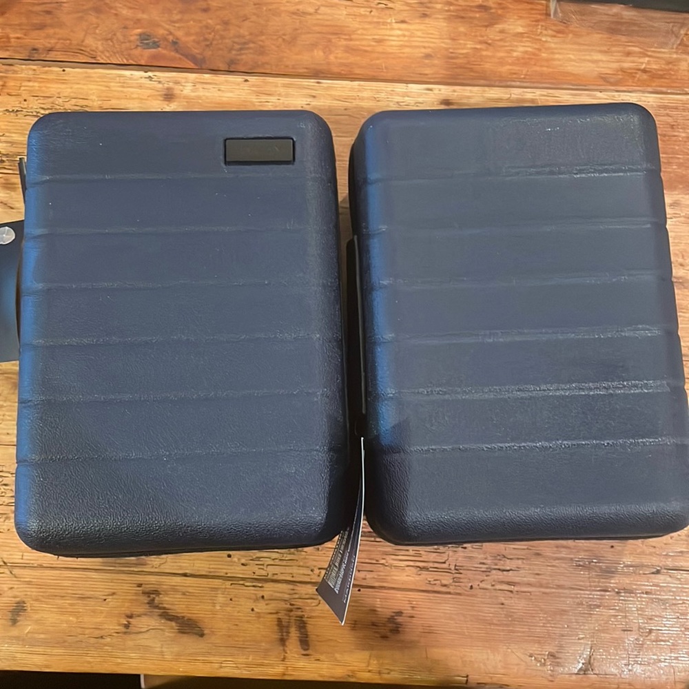 Two United x Away toiletry bags